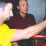 Training on the wooden dummy (Mook Yan Chong)