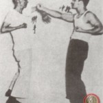 The late Bruce Lee with his sifu GM Ip Man during Dan Chi Sao
