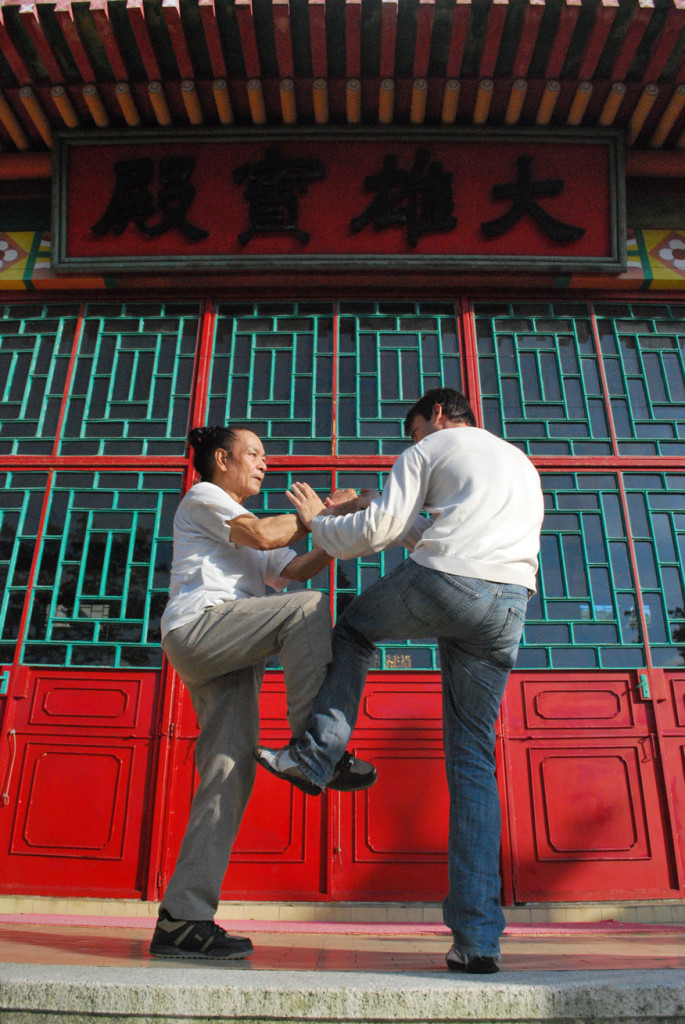 Sifu Sergio training in front of a Buddhist Temple with GM Cheng Kwong