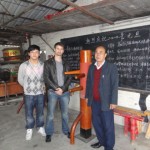 Sifu Sergio and his student Chung Kit with sifu Tam Woon Biu in his school