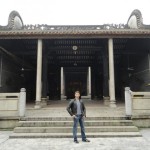 Inside the Chan family ancestral temple behind him the place where the late GM Ip Man got taught by his sihings Ng Chung So and Chan Yiu Ming