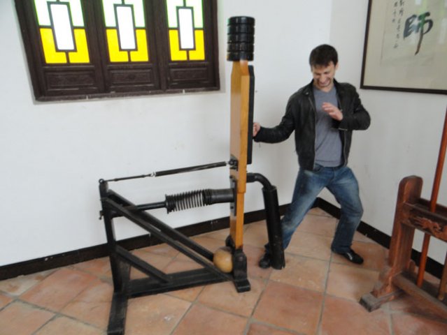 In the Bruce Lee museum in Sun Tak (Shunde) with one of the late Bruce Lee's  original training devices 